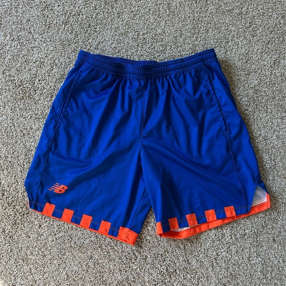 New Balance athletic shorts. Like new. Pockets. Elastic waist. Size Large. - Picture 1 of 9